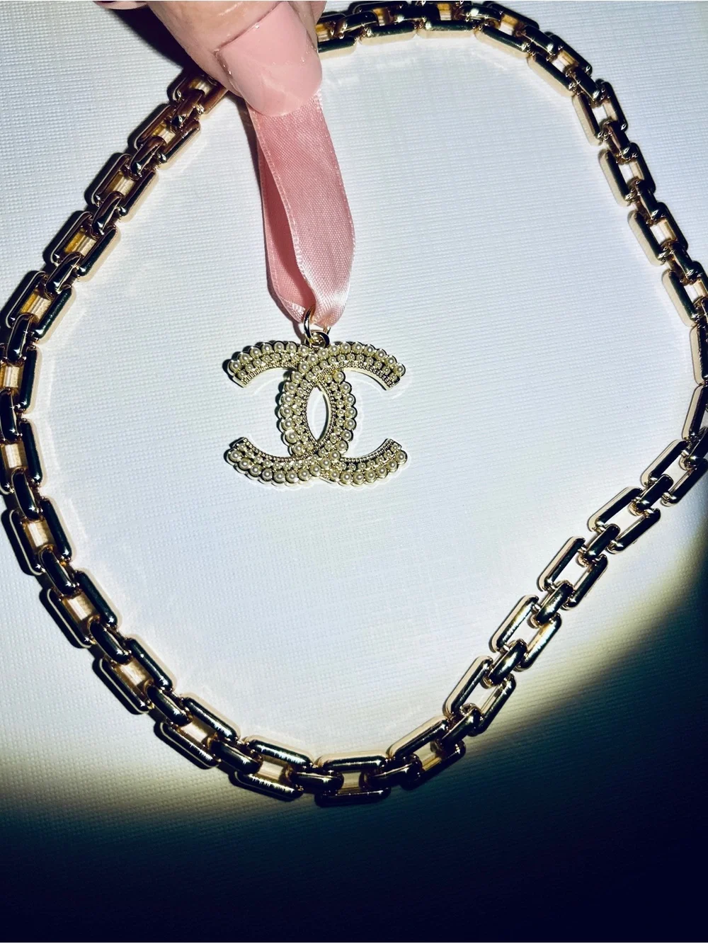 CHANEL Gold CC Pendant with Pink Ribbon New Elegant Chain